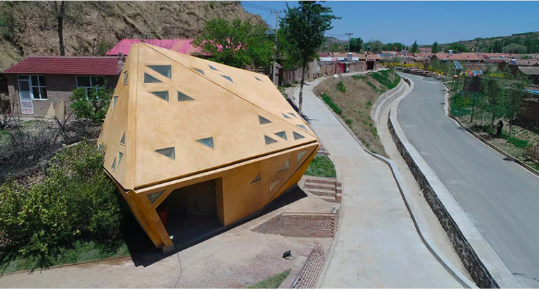 温度にあわせて開閉する幾何学的な家「operable interactive village hut」